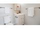 Bright bathroom features a white vanity with storage and a modern faucet at 717 Walden Ct, Highlands Ranch, CO 80126