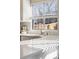 Bright kitchen with white countertop and natural light at 717 Walden Ct, Highlands Ranch, CO 80126