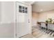 View of front door, light gray floors, and dining room at 717 Walden Ct, Highlands Ranch, CO 80126