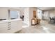 Interior view showing entry way, kitchen, dining area, and fireplace at 717 Walden Ct, Highlands Ranch, CO 80126