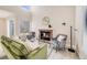Inviting living room with a brick fireplace and comfortable seating arrangement at 717 Walden Ct, Highlands Ranch, CO 80126