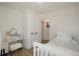 Well-lit bedroom with vanity, closet, and bright interior design at 4895 E Arizona Ave, Denver, CO 80246