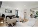 Contemporary living room with modern decor and neutral color palette at 4895 E Arizona Ave, Denver, CO 80246