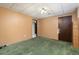 This finished basement space has a closet for storage and carpeted floors at 2434 S Ogden St # 2434-2436, Denver, CO 80210
