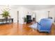 Open-concept living area featuring hardwood floors and ample space for entertaining at 2434 S Ogden St # 2434-2436, Denver, CO 80210