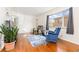 Cozy living room with hardwood floors, bright windows, and a comfortable seating arrangement at 2434 S Ogden St # 2434-2436, Denver, CO 80210