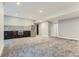 Finished basement with stylish bar area, stainless steel appliances, and ample space at 2540 Xavier St, Denver, CO 80212
