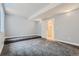 Spacious basement area with neutral color scheme, carpet, and recessed lighting at 2540 Xavier St, Denver, CO 80212