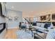 Bright open concept living space showing access to kitchen, dining, and stairs at 2540 Xavier St, Denver, CO 80212