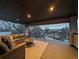 Expansive covered deck showcasing comfortable seating and neighborhood views at 2540 Xavier St, Denver, CO 80212
