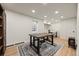 Spacious basement featuring light wood floors, recessed lighting, and a stylish area rug at 33379 Buffalo Park Rd, Evergreen, CO 80439