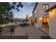 Rear exterior featuring outdoor seating and scenic views of the surrounding landscape at 33379 Buffalo Park Rd, Evergreen, CO 80439
