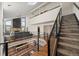 Open-concept floor plan showcases foyer staircase, and living room with vaulted ceilings at 33379 Buffalo Park Rd, Evergreen, CO 80439
