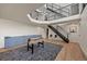 Game room featuring foosball table, a large area rug, and a black staircase at 33379 Buffalo Park Rd, Evergreen, CO 80439