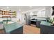 Open concept kitchen with stainless steel appliances and a large sink with green countertops at 33379 Buffalo Park Rd, Evergreen, CO 80439