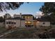 View of a home with a patio, outdoor seating, with well-maintained landscaping, perfect for outdoor relaxation at 33379 Buffalo Park Rd, Evergreen, CO 80439