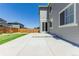 Backyard featuring a patio, grass, and a wood fence with a house at 12941 Delaware St, Westminster, CO 80234