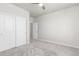 This bedroom features an open closet and a neutral color scheme creating a relaxing atmosphere at 12941 Delaware St, Westminster, CO 80234