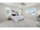Comfortable bedroom with a ceiling fan, a large bed, and decor providing a relaxing retreat at 12941 Delaware St, Westminster, CO 80234