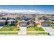Home with brick and siding exterior, attached garage, landscaping, and spacious front yard at 12941 Delaware St, Westminster, CO 80234