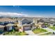 Charming two-story home featuring a landscaped yard, a two-car garage, and a cozy front porch, all under a bright blue sky at 12941 Delaware St, Westminster, CO 80234