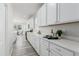 Beautiful kitchen with white cabinetry, quartz countertops, and stainless steel appliances at 12941 Delaware St, Westminster, CO 80234