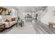 Bright open-concept living room featuring hardwood floors and a comfortable sofa at 12941 Delaware St, Westminster, CO 80234
