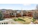 A large backyard with a lawn, fence, and mountain views from the deck at 6143 Eldora St, Golden, CO 80403