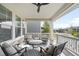 Cozy covered deck offering comfortable seating and a serene outdoor living space with picturesque views at 6143 Eldora St, Golden, CO 80403