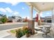 Inviting front porch with comfortable seating and beautiful landscaping, showcasing the home's curb appeal at 6143 Eldora St, Golden, CO 80403