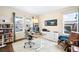 Bright office features a large window, hardwood floors, and space for all your working needs at 6143 Eldora St, Golden, CO 80403