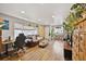 Spacious living room filled with natural light, hardwood floors, and modern decor at 1801 S Eudora St, Denver, CO 80222