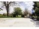 Enjoy outdoor living with a spacious patio, basketball court, and plenty of space to relax at 7060 S Windsor St, Littleton, CO 80128
