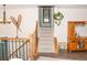 Inviting entryway with hardwood floors, chandelier, and a staircase leading to the upper level at 10911 Tennyson Ct, Westminster, CO 80031