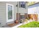 Inviting front entrance with a clear glass door, brick accents, and a well-maintained lawn, creating a warm welcome at 10911 Tennyson Ct, Westminster, CO 80031