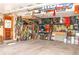 Well-organized garage with storage, a workbench, and easy access to outdoor gear at 10911 Tennyson Ct, Westminster, CO 80031