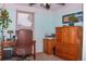 Home office with desk, chair, storage cabinet, and a window providing natural light at 10911 Tennyson Ct, Westminster, CO 80031