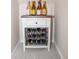 Compact wine storage unit displaying an assortment of wines in a small, well-lit space at 10911 Tennyson Ct, Westminster, CO 80031