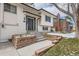 Beautiful front entrance with brick accents and a well-maintained walkway leading to the front door at 2221 S Arbutus Ct, Lakewood, CO 80228