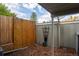 Private backyard patio with wood fence and landscaping at 2427 E Fremont Ct, Centennial, CO 80122