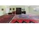 Expansive living area showcasing a collection of antique furniture and decorative Persian rugs at 7877 E Mississippi Ave # 607, Denver, CO 80247