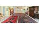 Expansive living area showcasing a collection of antique furniture and decorative Persian rugs at 7877 E Mississippi Ave # 607, Denver, CO 80247