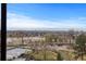 Panoramic view of the city skyline and surrounding greenery from the condo at 7877 E Mississippi Ave # 607, Denver, CO 80247