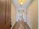 Bright foyer with hardwood floors leading into the home at 9477 Market Ln, Parker, CO 80134