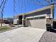 Beautiful single-Gathering home featuring stone accents and an attached two-car garage at 9477 Market Ln, Parker, CO 80134