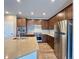 Modern kitchen with stainless steel appliances and island at 9477 Market Ln, Parker, CO 80134