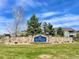 Stonegate North Villages community entrance sign surrounded by lush landscaping at 9477 Market Ln, Parker, CO 80134