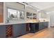 Modern kitchen with stainless steel appliances, sleek cabinetry, and bright natural light at 1392 S Edison Way, Denver, CO 80222