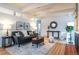 Stylish living room featuring a comfortable sofa, modern coffee table, and decorative lighting at 1392 S Edison Way, Denver, CO 80222