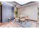 Beautiful patio featuring neutral decor, covered from the elements at 1392 S Edison Way, Denver, CO 80222